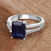 Glass Filled Blue Sapphire and White Zircon Sterling Silver Ring